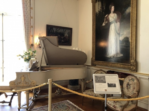 Showing Grand piano in music room